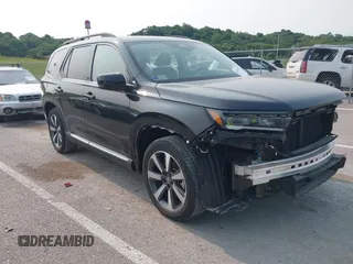 2023 Honda Pilot Elite with VIN 5FNYG1H81PB050321, listed as a IAAI auction lot 42346325 with 13,201 mi miles and . Bid and sale history available at DreamBid. Image 1.