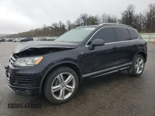 2014 Volkswagen Touareg R-Line с VIN WVGDF9BP3ED008538, выставлен на аукционе Copart как лот 55024235 с пробегом 84 201 миль миль и Списание • Salvage title. История ставок и продаж доступна на DreamBid. Изображение 1.