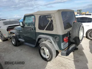 2003 Jeep Wrangler Sport with VIN 1J4FA49S43P301542, listed as a Copart auction lot 75704824 with Not Provided miles and Salvage Title. Bid and sale history available at carsss.com. Image 2.
