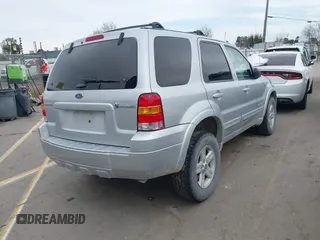 2005 Ford Escape Hybrid with VIN 1FMCU95H05KC95225, listed as a IAAI auction lot 41798610 with 216,659 mi miles and . Bid and sale history available at DreamBid. Image 4.