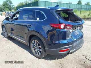 2019 Mazda CX-9 Grand Touring with VIN JM3TCBDY6K0335886, listed as a IAAI auction lot 42704250 with 37,171 mi miles and . Bid and sale history available at DreamBid. Image 3.