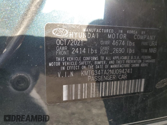2022 Genesis G70 2.0T with VIN KMTG34TA2NU094241, listed as a Copart auction lot 73439144 with 52,352 mi miles and Salvage Title. Bid and sale history available at DreamBid. Image 13.