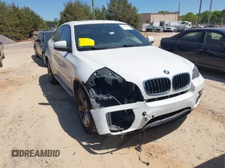 2014 BMW X6 xDrive35i with VIN 5UXFG2C53E0C44047, listed as a IAAI auction lot 42057685 with 145,912 mi miles. Bid and sale history available at carsss.com. Image 1.