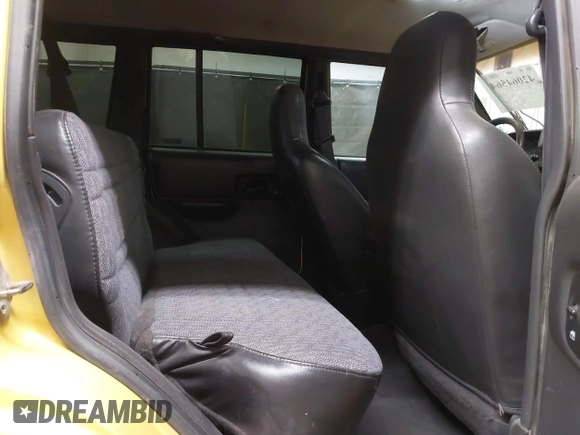 2001 Jeep Cherokee Sport with VIN 1J4FF48S41L580319, listed as a IAAI auction lot 42064564 with 257,534 mi miles and . Bid and sale history available at DreamBid. Image 8.
