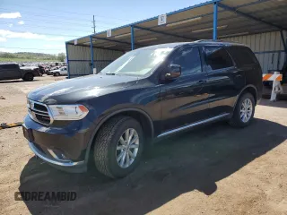 2014 Dodge Durango SXT with VIN 1C4RDJAG1EC972595, listed as a Copart auction lot 57133105 with 126,011 mi miles and Clean title. Bid and sale history available at DreamBid. Image 1.