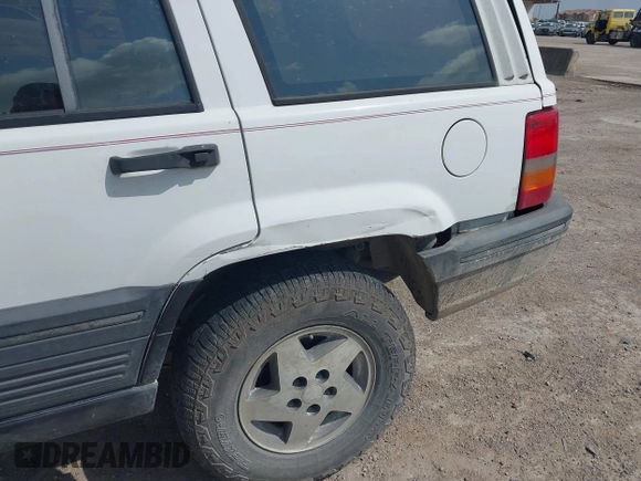 1994 Jeep Grand Cherokee Laredo with VIN 1J4FX58SXRC120936, listed as a IAAI auction lot 42530212 with 126,367 mi miles and . Bid and sale history available at DreamBid. Image 17.