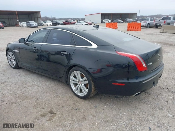 2015 Jaguar XJ with VIN SAJWJ2GD0F8V85914, listed as a IAAI auction lot 41615059 with 115,462 mi miles. Bid and sale history available at carsss.com. Image 3.