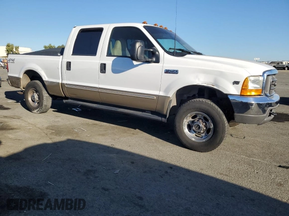 2000 Ford Super Duty F-250 XL with VIN 1FTNW21S1YED65639, listed as a Copart auction lot 74377194 with 158,387 mi miles and Salvage Title. Bid and sale history available at carsss.com. Image 4.