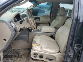 2004 Ford F-150 XLT with VIN 1FTPW14574KB96621, listed as a Copart auction lot 61137655 with 220,659 mi miles and Salvage title. Bid and sale history available at DreamBid. Image 7.