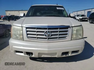 2003 Cadillac Escalade с VIN 1GYEC63T63R290034, выставлен на аукционе Copart как лот 46844735 с пробегом 304 433 миль миль и Чистый • Clean title. История ставок и продаж доступна на DreamBid. Изображение 5.