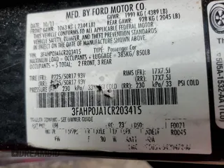 2012 Ford Fusion SEL with VIN 3FAHP0JA1CR203415, listed as a Copart auction lot 41707235 with 326,401 mi miles and Salvage Title. Bid and sale history available at carsss.com. Image 12.