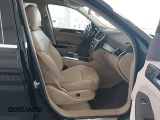 2014 Mercedes-Benz GL 450 z VIN 4JGDF7CE7EA435479, wystawiony jako IAAI lot #42280243 z przebiegiem 138 930 mil mil oraz . Historia ofert i sprzedaży dostępna na DreamBid. Obrazek 5.