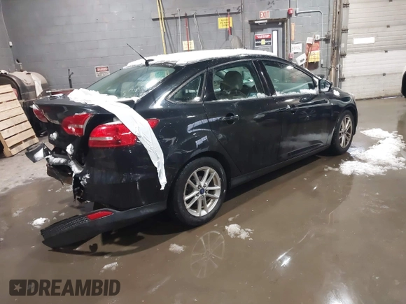2015 Ford Focus SE with VIN 1FADP3F26FL370311, listed as a IAAI auction lot 41514842 with 126,444 mi miles and . Bid and sale history available at DreamBid. Image 4.