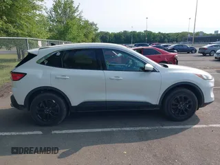 2020 Ford Escape SE with VIN 1FMCU9G6XLUA82702, listed as a IAAI auction lot 42390545 with 65,295 mi miles and . Bid and sale history available at DreamBid. Image 13.
