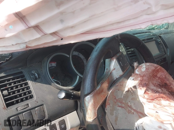 2013 Toyota Tacoma z VIN 5TFUX4EN2DX019669, wystawiony jako IAAI lot #42368685 z przebiegiem Nie podano mil oraz . Historia ofert i sprzedaży dostępna na DreamBid. Obrazek 7.