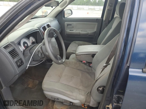 2005 Dodge Dakota SLT with VIN 1D7HE48NX5S308595, listed as a Copart auction lot 56713434 with 257,419 mi miles and Salvage Title. Bid and sale history available at DreamBid. Image 7.