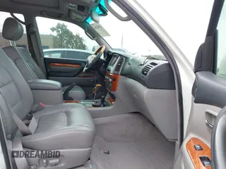 2004 Lexus LX 470 z VIN JTJHT00W043543915, wystawiony jako IAAI lot #41902858 z przebiegiem 110 454 mil mil oraz . Historia ofert i sprzedaży dostępna na DreamBid. Obrazek 5.