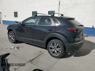 2023 Mazda CX-30 S Carbon Edition with VIN 3MVDMBCM6PM504431, listed as a Copart auction lot 61154795 with 90,396 mi miles and Salvage title. Bid and sale history available at DreamBid. Image 2.
