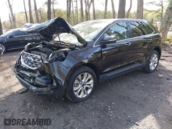 2022 Ford Edge Titanium with VIN 2FMPK4K95NBB06151, listed as a IAAI auction lot 41932545 with 57,762 mi miles and . Bid and sale history available at DreamBid. Image 17.