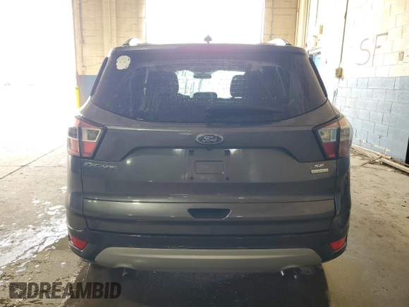 2018 Ford Escape SE with VIN 1FMCU0GD1JUB51879, listed as a Copart auction lot 53895865 with 124,789 mi miles and Clean Title. Bid and sale history available at carsss.com. Image 6.