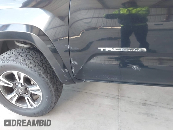 2016 Toyota Tacoma SR with VIN 5TFCZ5AN8GX020900, listed as a IAAI auction lot 41911329 with 133,931 mi miles. Bid and sale history available at carsss.com. Image 17.