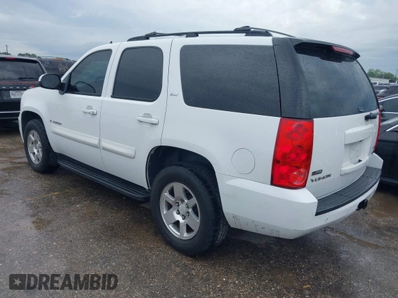 2009 GMC Yukon SLT w/4SA with VIN 1GKFK33049R153415, listed as a IAAI auction lot 41896770 with 182,256 mi miles. Bid and sale history available at carsss.com. Image 3.