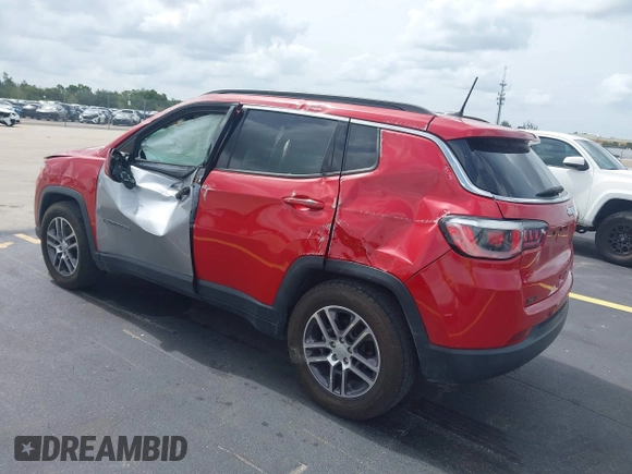 2019 Jeep Compass Latitude with VIN 3C4NJCBB8KT843811, listed as a IAAI auction lot 42442207 with 83,608 mi miles and . Bid and sale history available at DreamBid. Image 3.