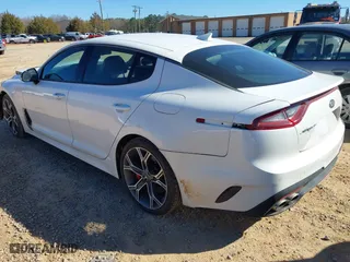 2019 Kia Stinger GT with VIN KNAE35LC8K6050559, listed as a IAAI auction lot 41699927 with 85,944 mi miles. Bid and sale history available at carsss.com. Image 3.