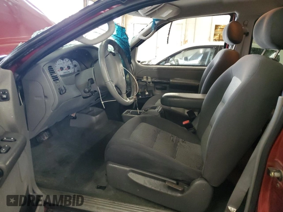2003 Ford Explorer Sport XLS z VIN 1FMYU60EX3UC05405, wystawiony jako Copart lot #54211015 z przebiegiem 99 212 mil mil oraz Nie do naprawy • Non repairable. Historia ofert i sprzedaży dostępna na DreamBid. Obrazek 7.