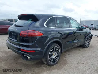 2017 Porsche Cayenne with VIN WP1AA2A2XHKA90706, listed as a IAAI auction lot 41692768 with 92,800 mi miles. Bid and sale history available at carsss.com. Image 4.