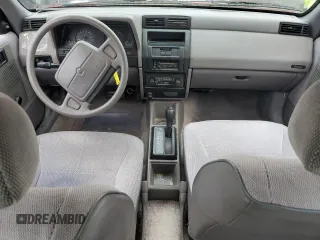 1992 Plymouth Sundance z VIN 1P3XP28D4NN165248, wystawiony jako Copart lot #44205855 z przebiegiem 70 897 mil mil oraz Tytuł czysty. Historia ofert i sprzedaży dostępna na DreamBid. Obrazek 9.