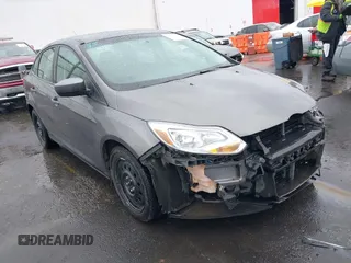 2012 Ford Focus SE with VIN 1FAHP3F24CL217777, listed as a IAAI auction lot 41831391 with 218,308 mi miles. Bid and sale history available at carsss.com. Image 1.