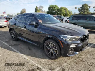 2021 BMW X6 xDrive40i with VIN 5UXCY6C04M9H02068, listed as a Copart auction lot 46938645 with 21,913 mi miles and Salvage Title. Bid and sale history available at carsss.com. Image 4.