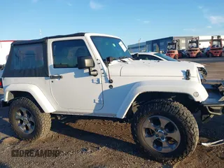2018 Jeep Wrangler Sahara with VIN 1C4AJWBG2JL821132, listed as a IAAI auction lot 42523688 with 86,244 mi miles and . Bid and sale history available at DreamBid. Image 13.