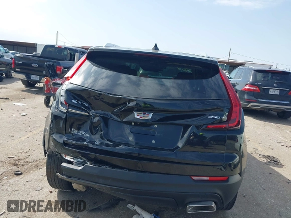 2023 Cadillac XT4 FWD Luxury with VIN 1GYAZAR47PF159153, listed as a IAAI auction lot 41580375 with 24,362 mi miles and . Bid and sale history available at DreamBid. Image 6.