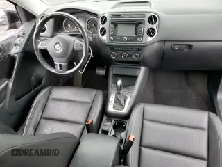 2013 Volkswagen Tiguan SE z VIN WVGBV7AX6DW550316, wystawiony jako Copart lot #56964595 z przebiegiem 157 526 mil mil oraz Szkoda całkowita • Salvage title. Historia ofert i sprzedaży dostępna na DreamBid. Obrazek 8.