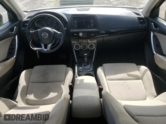 2014 Mazda CX-5 Sport with VIN JM3KE2BE9E0344990, listed as a Copart auction lot 59014145 with 126,905 mi miles and Salvage title. Bid and sale history available at DreamBid. Image 8.