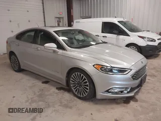 2018 Ford Fusion Titanium with VIN 3FA6P0RU9JR131818, listed as a IAAI auction lot 42442448 with 191,757 mi miles and . Bid and sale history available at DreamBid. Image 1.