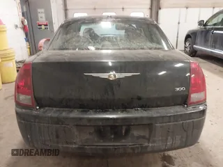 2007 Chrysler 300 with VIN 2C3LA43R17H860639, listed as a IAAI auction lot 41481326 with 163,837 mi miles. Bid and sale history available at carsss.com. Image 16.