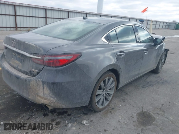 2020 Mazda 6 Grand Touring with VIN JM1GL1TY6L1525169, listed as a IAAI auction lot 41683512 with 73,313 mi miles and . Bid and sale history available at DreamBid. Image 4.
