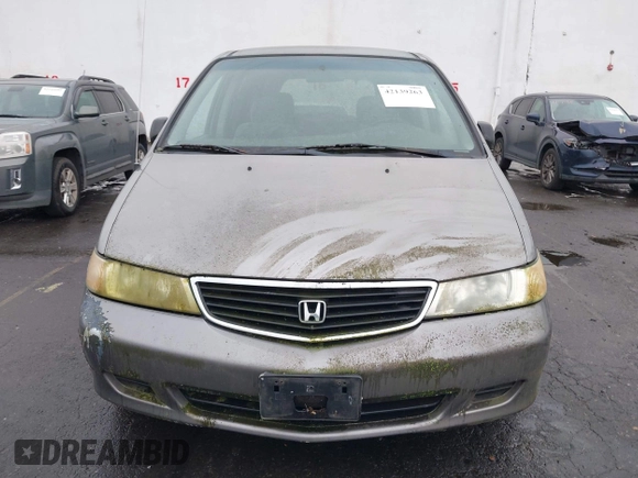 2000 Honda Odyssey LX z VIN 2HKRL1857YH570211, wystawiony jako IAAI lot #42139263 z przebiegiem 161 983 mil mil oraz . Historia ofert i sprzedaży dostępna na DreamBid. Obrazek 6.