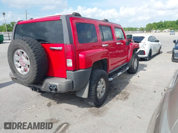 2007 Hummer H3 SUV with VIN 5GTDN13E678100639, listed as a IAAI auction lot 42169342 with 239,906 mi miles. Bid and sale history available at carsss.com. Image 4.