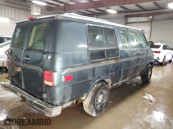 1995 Chevrolet Chevy Van z VIN 1GBEG25K2SF243949, wystawiony jako Copart lot #50422305 z przebiegiem 193 169 mil mil oraz Szkody całkowita. Historia ofert i sprzedaży dostępna na DreamBid. Obrazek 3.