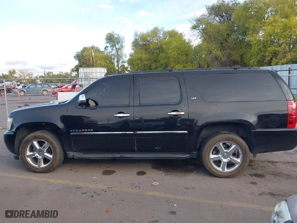 2011 Chevrolet Suburban LTZ with VIN 1GNSKKE34BR203562, listed as a IAAI auction lot 40628847 with NaN miles. Bid and sale history available at carsss.com. Image 14.