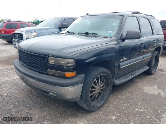 2003 Chevrolet Tahoe LT with VIN 1GNEC13Z13J297511, listed as a IAAI auction lot 41902595 with 293,195 mi miles. Bid and sale history available at carsss.com. Image 2.