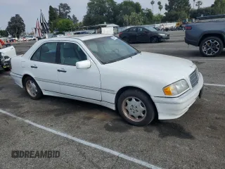 2000 Mercedes-Benz C 230 Kompressor with VIN WDBHA24G1YA820238, listed as a Copart auction lot 55563994 with 264,556 mi miles and Salvage Title. Bid and sale history available at carsss.com. Image 4.
