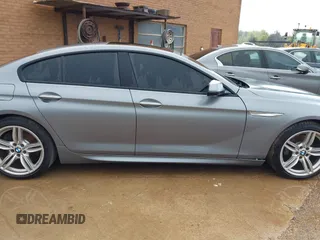 2016 BMW 6 Series 640i xDrive with VIN WBA6D2C58GGT66160, listed as a IAAI auction lot 41130666 with 102,064 mi miles and . Bid and sale history available at carsss.com. Image 14.