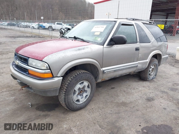 2000 Chevrolet Blazer LS z VIN 1GNCT18W7YK252323, wystawiony jako IAAI lot #41842766 z przebiegiem 149 462 mil mil oraz . Historia ofert i sprzedaży dostępna na DreamBid. Obrazek 2.