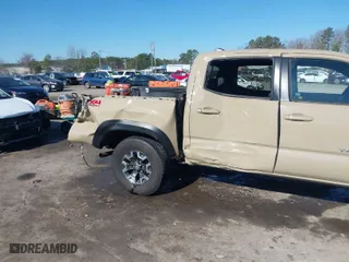 2020 Toyota Tacoma 4WD SR5 with VIN 3TMCZ5AN2LM356140, listed as a IAAI auction lot 41751425 with 80,671 mi miles. Bid and sale history available at carsss.com. Image 6.