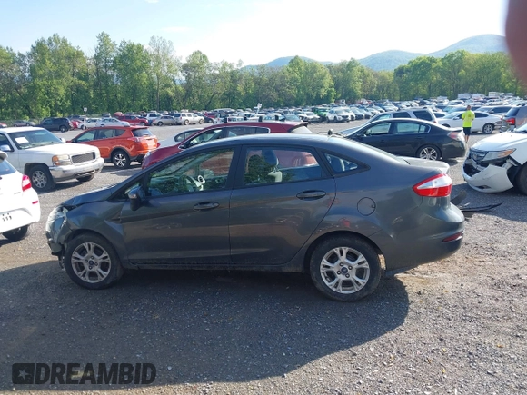 2016 Ford Fiesta SE z VIN 3FADP4BJ8GM184675, wystawiony jako IAAI lot #42169234 z przebiegiem 54 231 mil mil oraz . Historia ofert i sprzedaży dostępna na DreamBid. Obrazek 15.